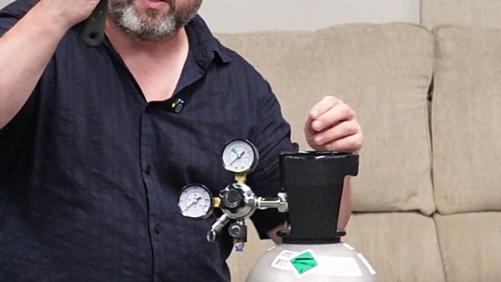 Tightening the regulator with a wrench