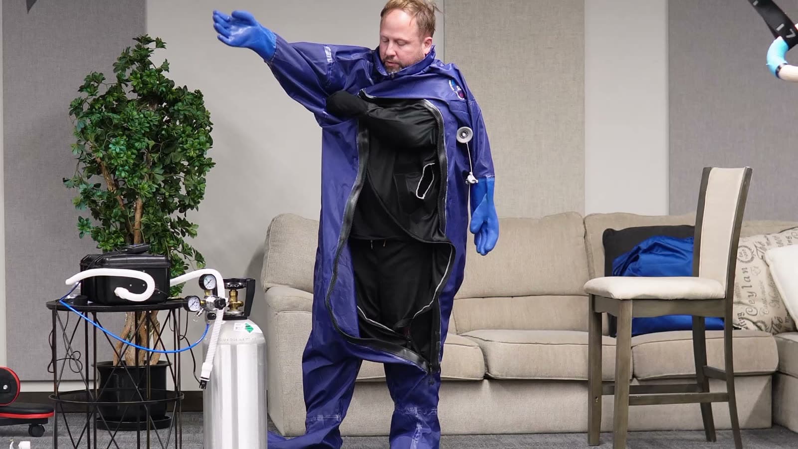 Arms into the suit sleeves