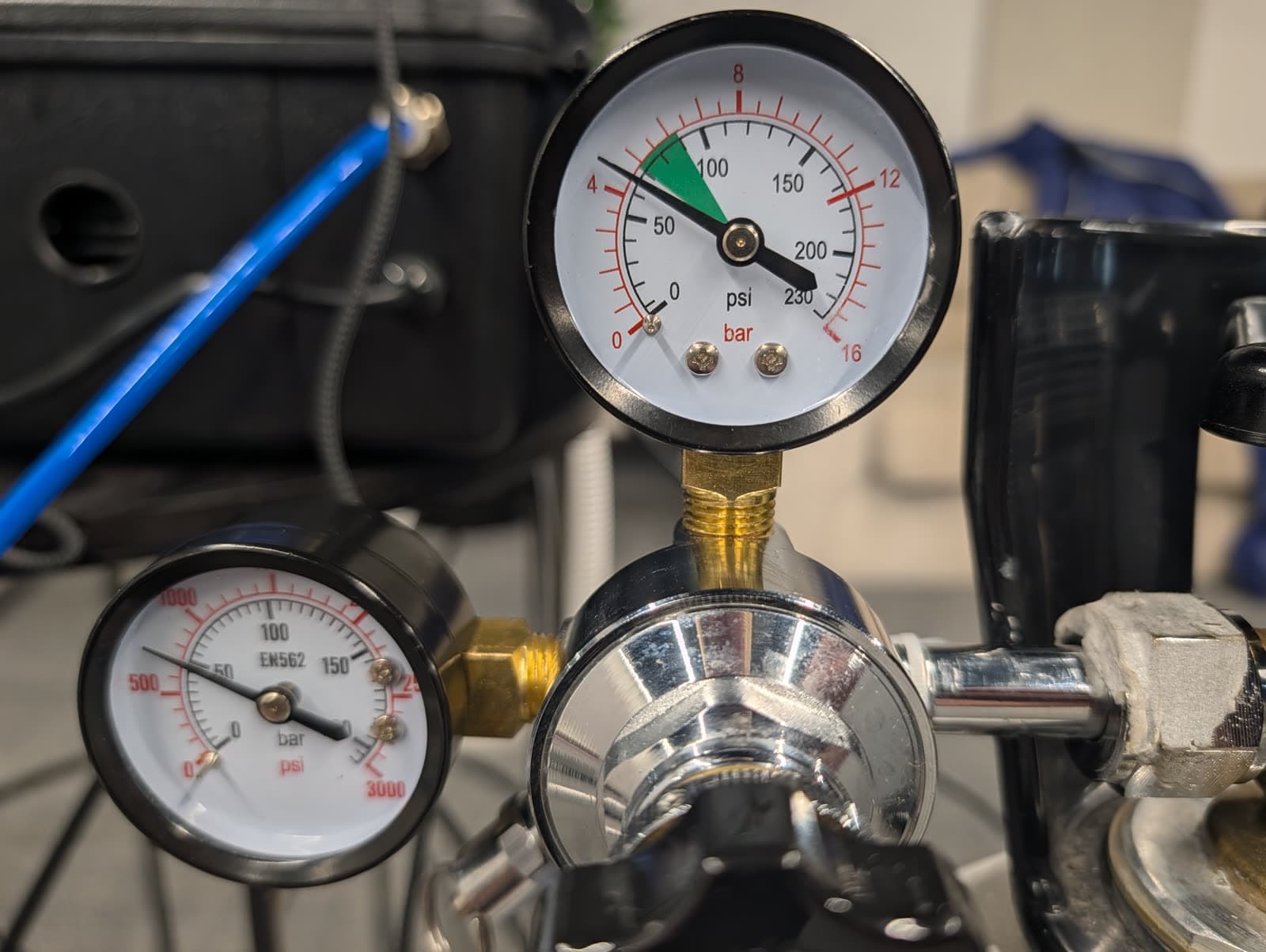 Regulator gauges with the needle near the green zone
